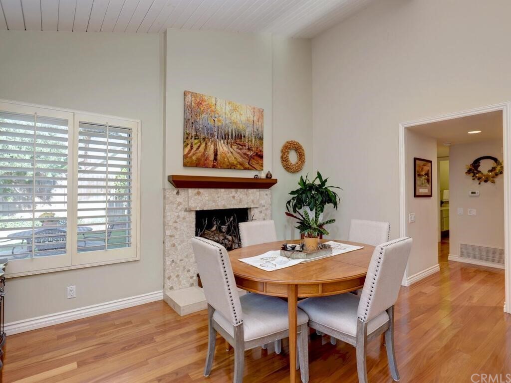 7 Sunridge Irvine, CA 92604 - Photo 18 of 66 a dining room with furniture and wooden floor
