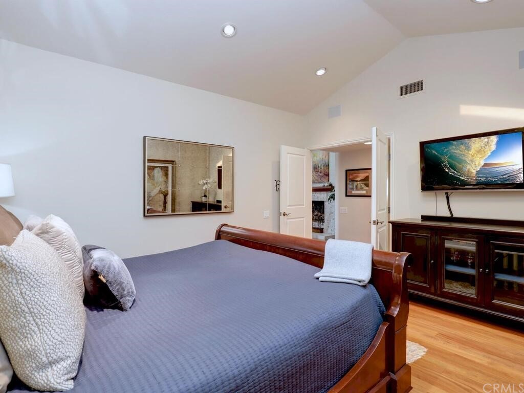 7 Sunridge Irvine, CA 92604 - Photo 29 of 66 a bedroom with a bed and a flat screen tv