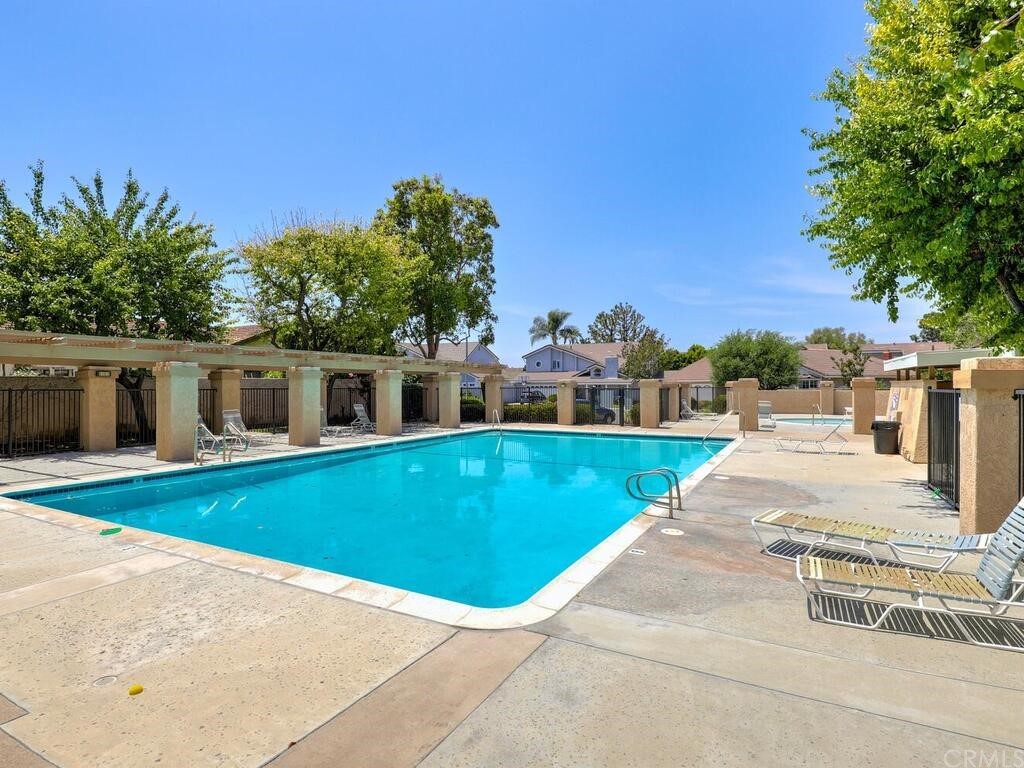 7 Sunridge Irvine, CA 92604 - Photo 61 of 66 a view of a house with a swimming pool