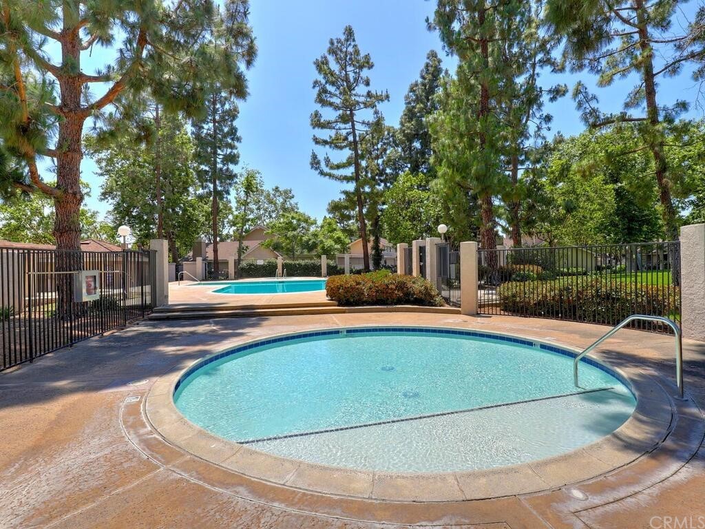 7 Sunridge Irvine, CA 92604 - Photo 64 of 66 a view of a swimming pool with a patio