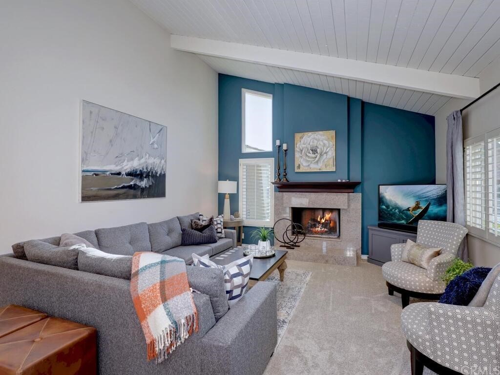 7 Sunridge Irvine, CA 92604 - Photo 9 of 66 a living room with furniture and a fireplace