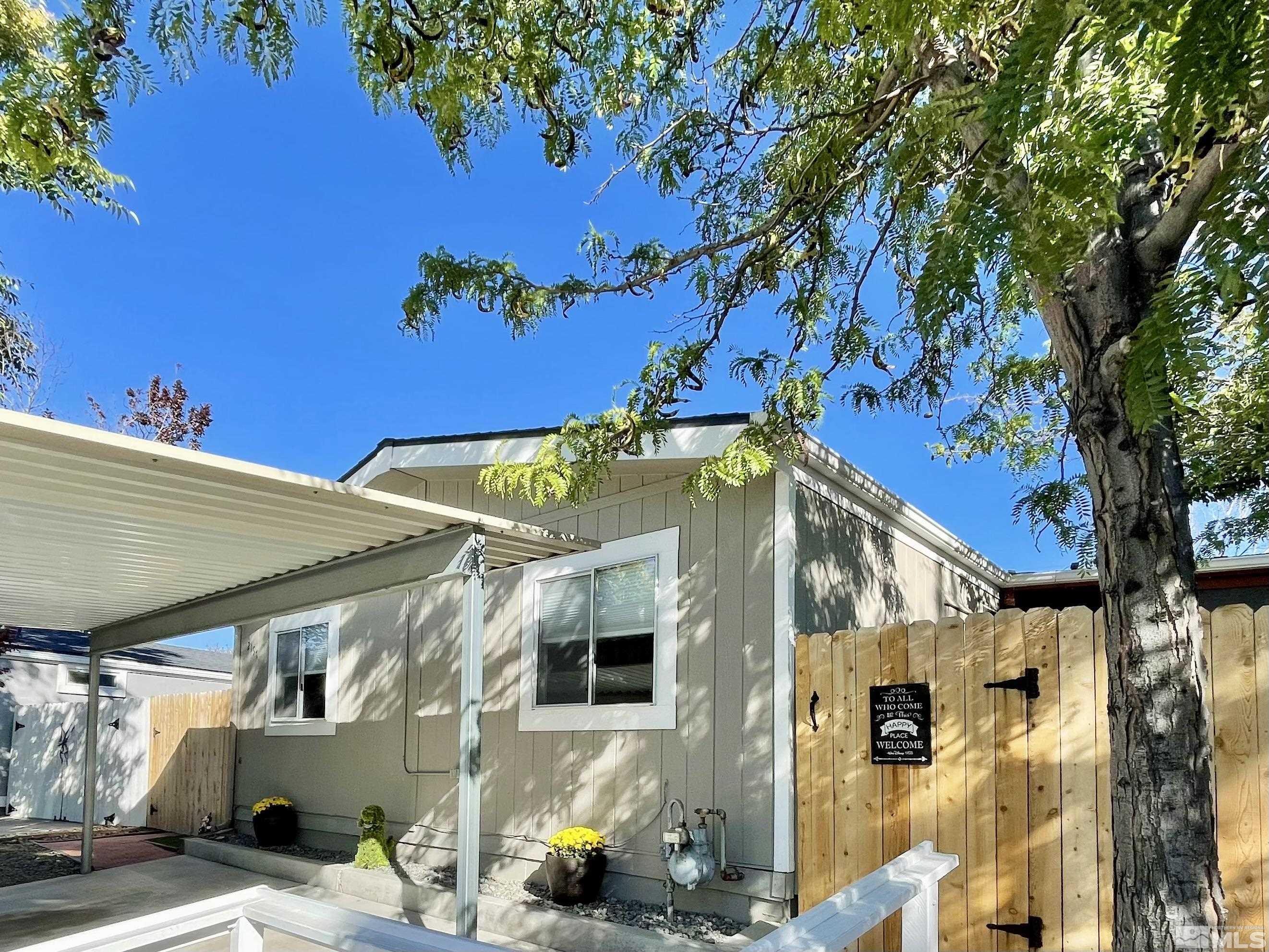 2197 Barberry Way Reno, NV 89512 - Photo 1 of 18 a view of a back yard of the house