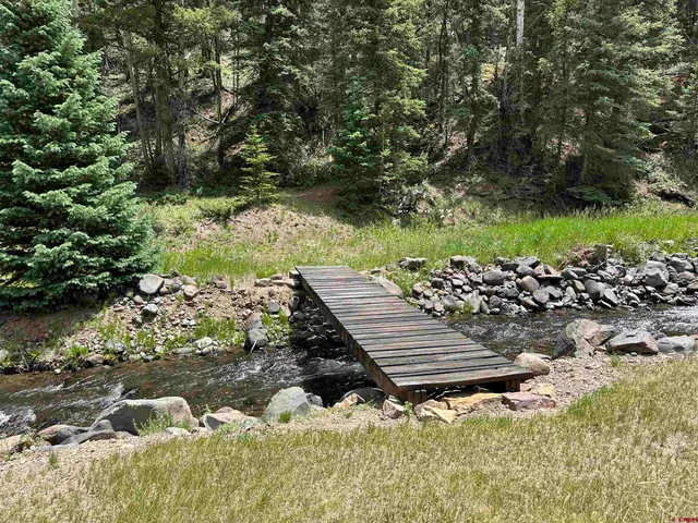 a view of a wooden floor with a yard