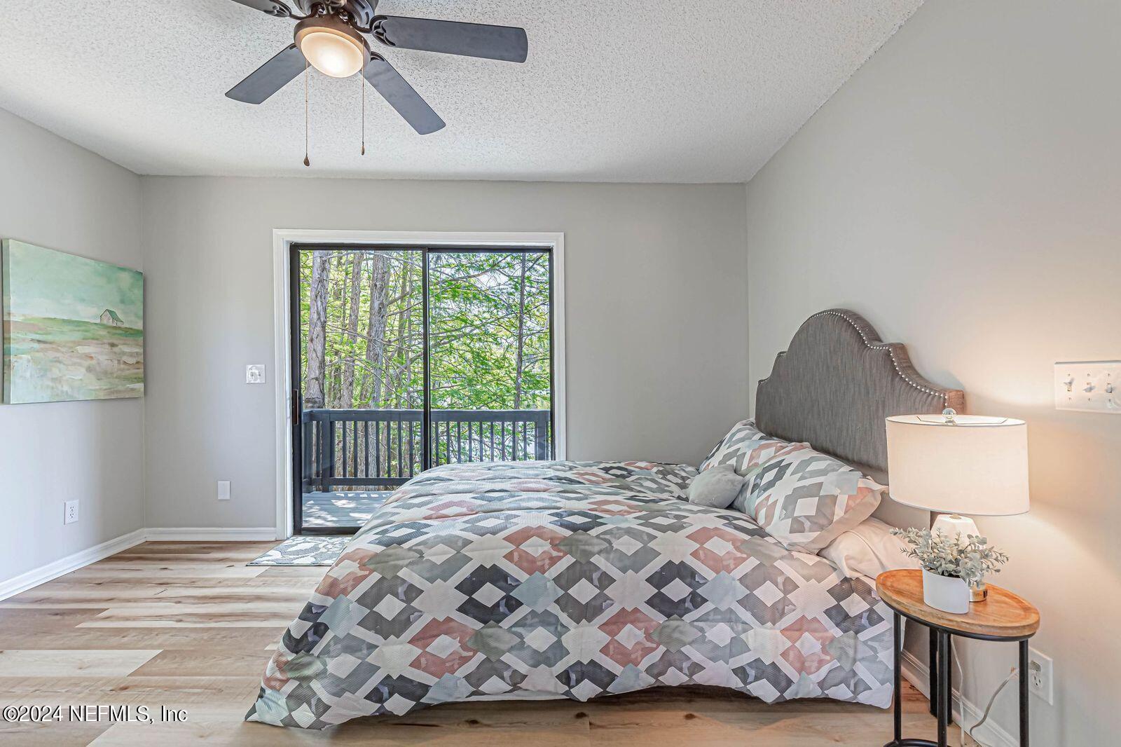 565 Roberts Road St. Johns, FL 32259 - Photo 36 of 79 a bedroom with a bed and window