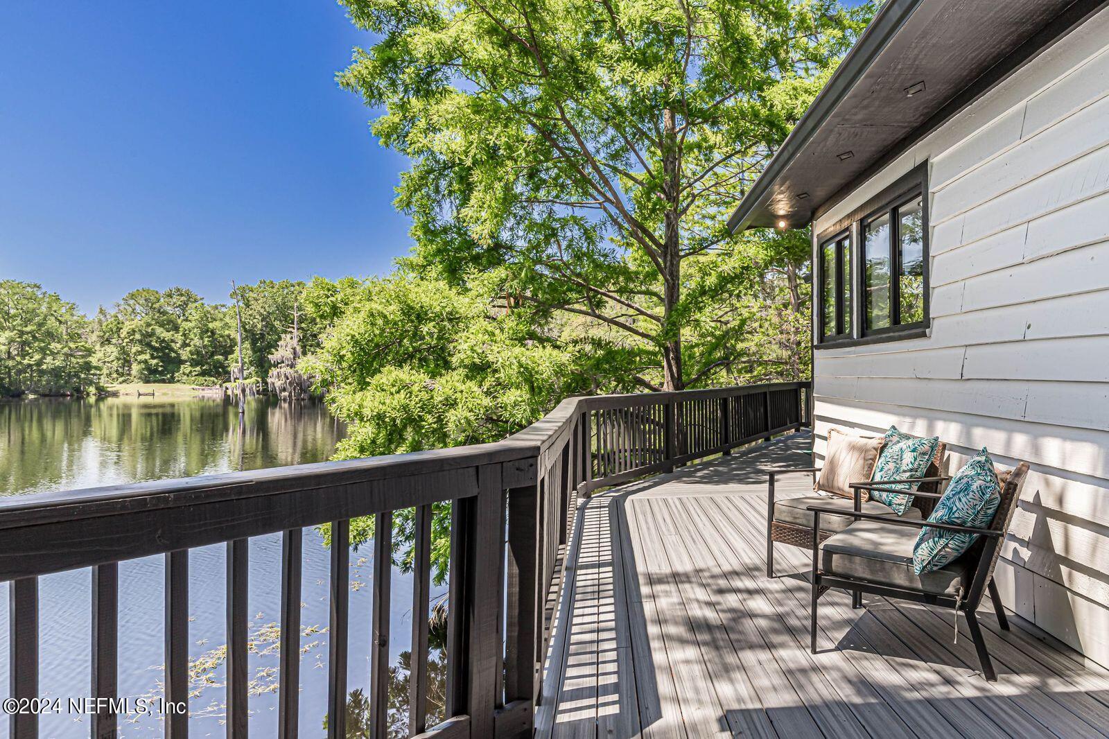 565 Roberts Road St. Johns, FL 32259 - Photo 54 of 79 a view of balcony with chairs and wooden fence