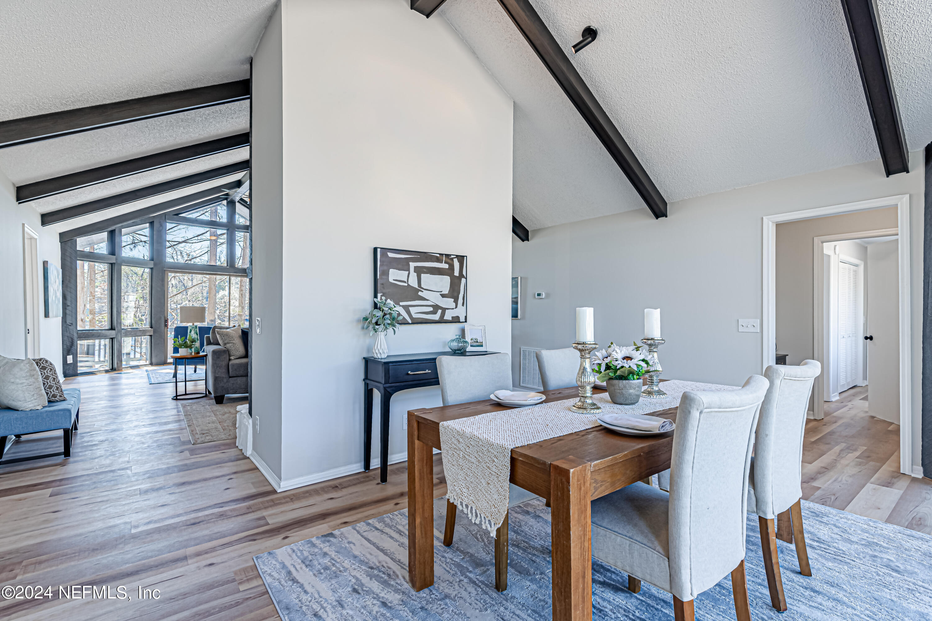 565 Roberts Road St. Johns, FL 32259 - Photo 6 of 79 a dining room with furniture and wooden floor