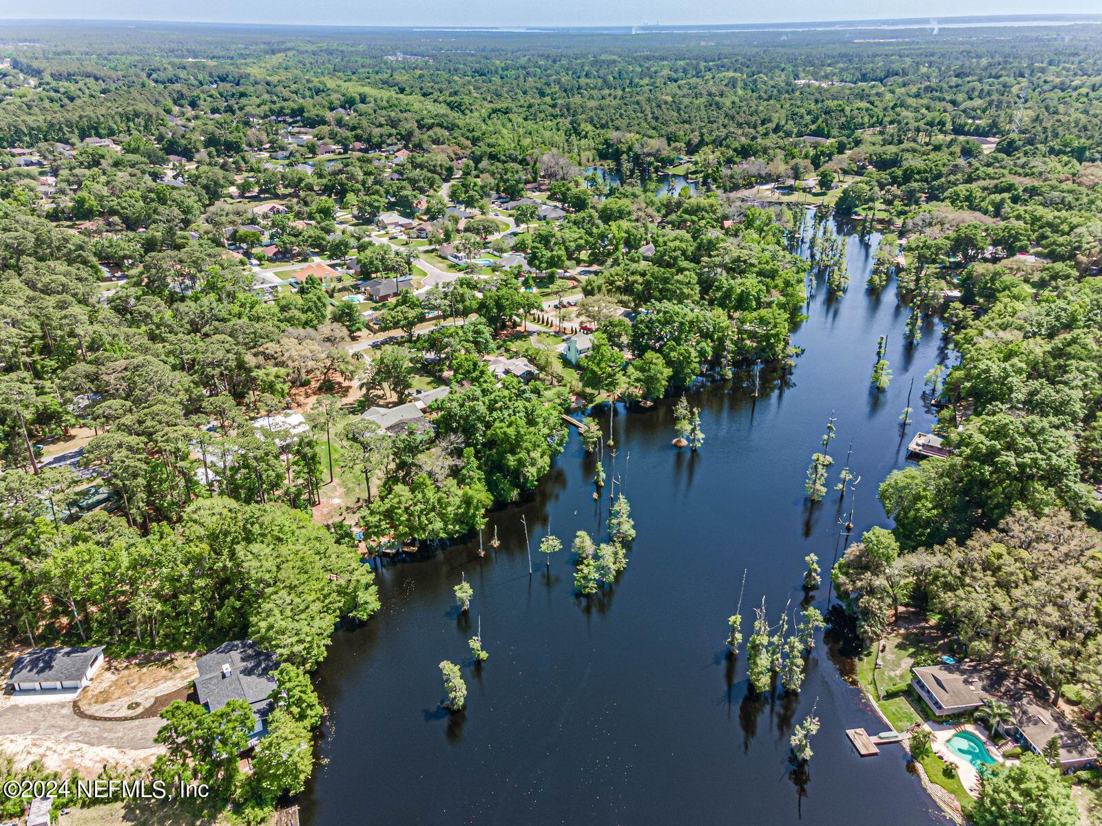 565 Roberts Road St. Johns, FL 32259 - Photo 64 of 79 an aerial view of lake residential house with outdoor space