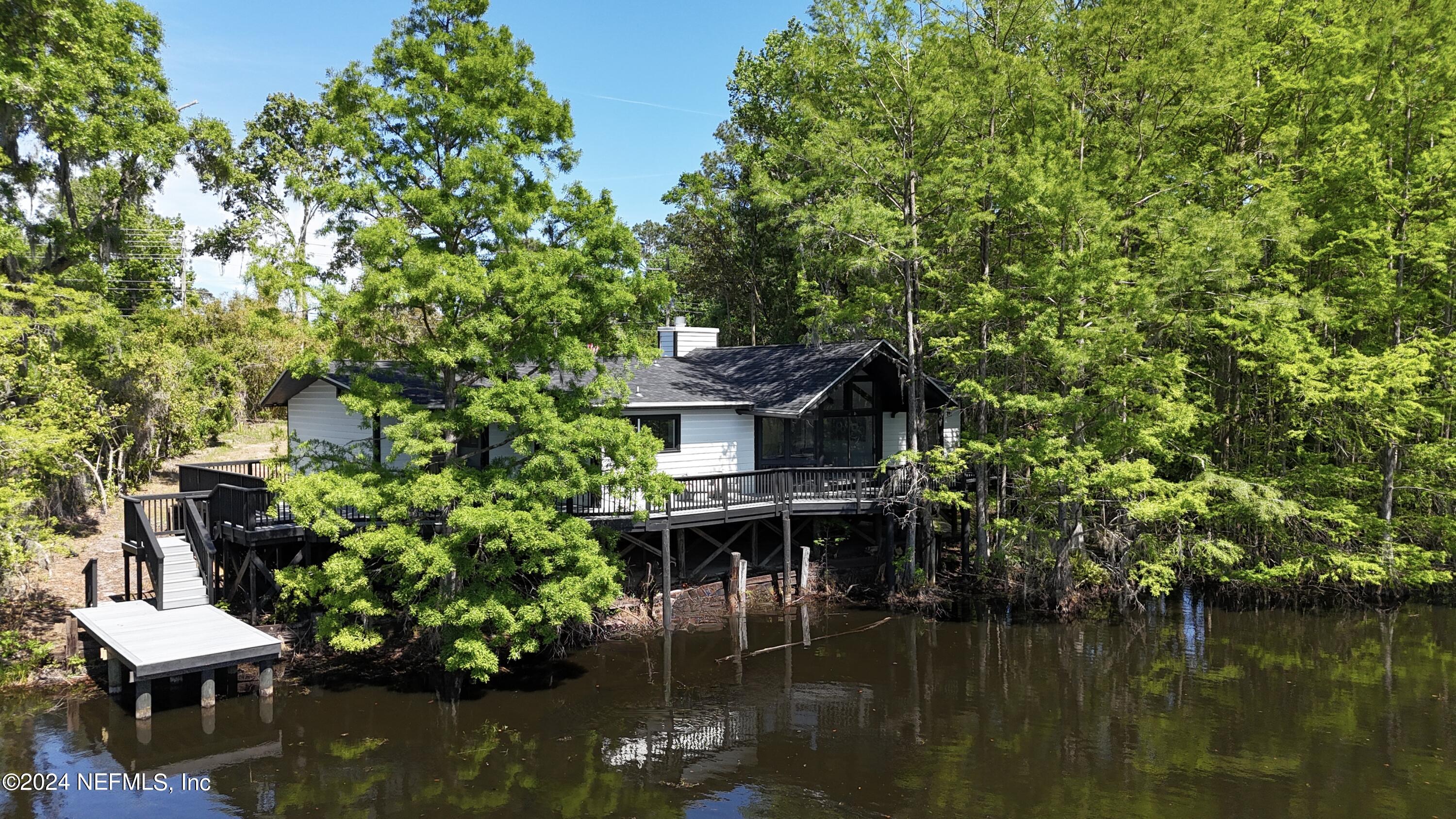 565 Roberts Road St. Johns, FL 32259 - Photo 71 of 79 a view of a house with a lake view
