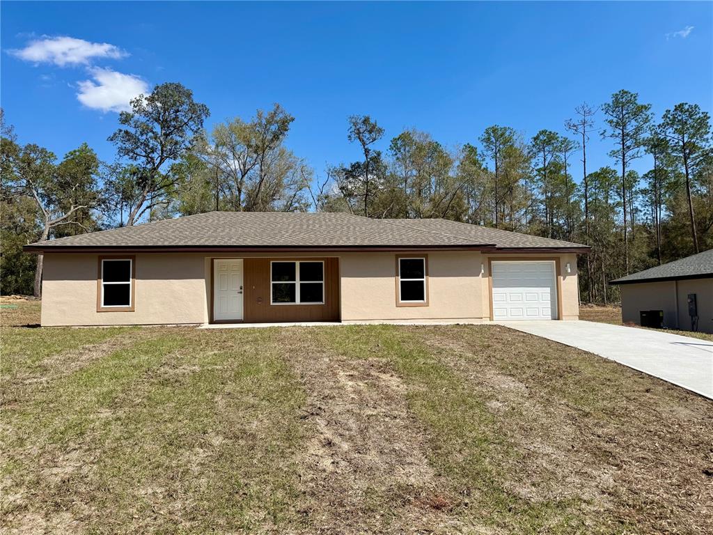 front view of house with a yard