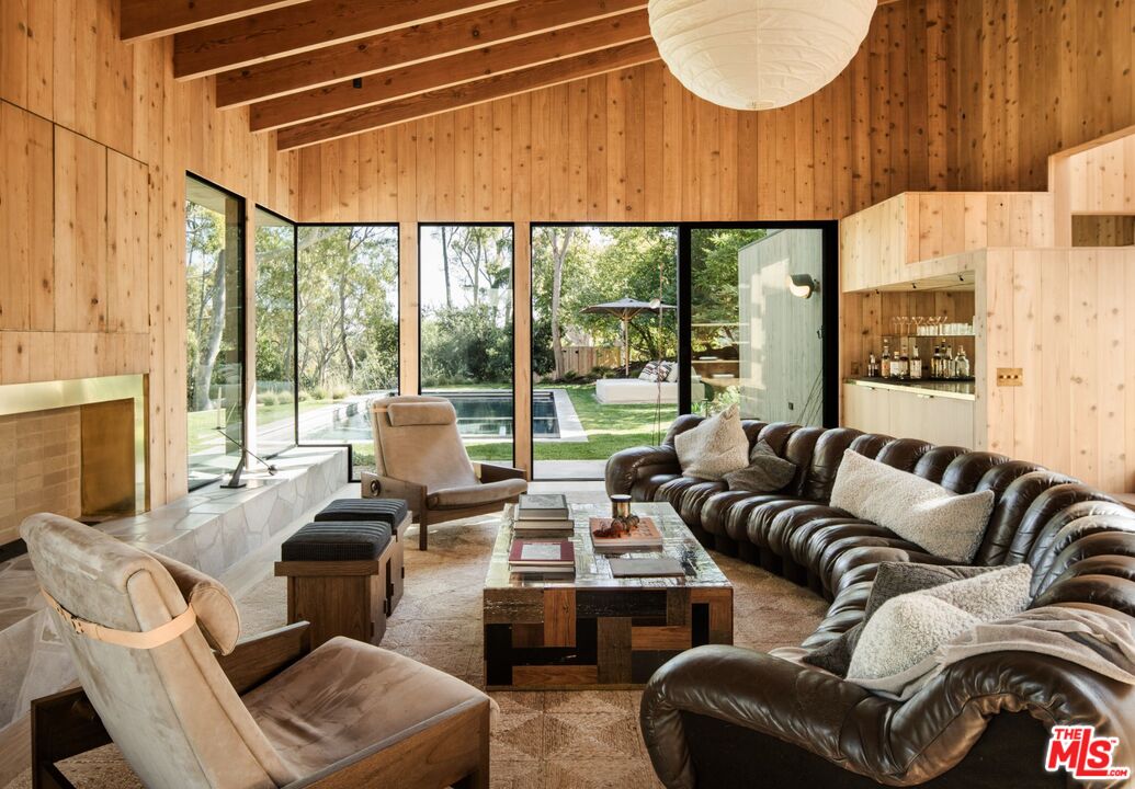 28779 Sea Ranch Way Malibu, CA 90265 - Photo 2 of 23 a living room with furniture and a large window