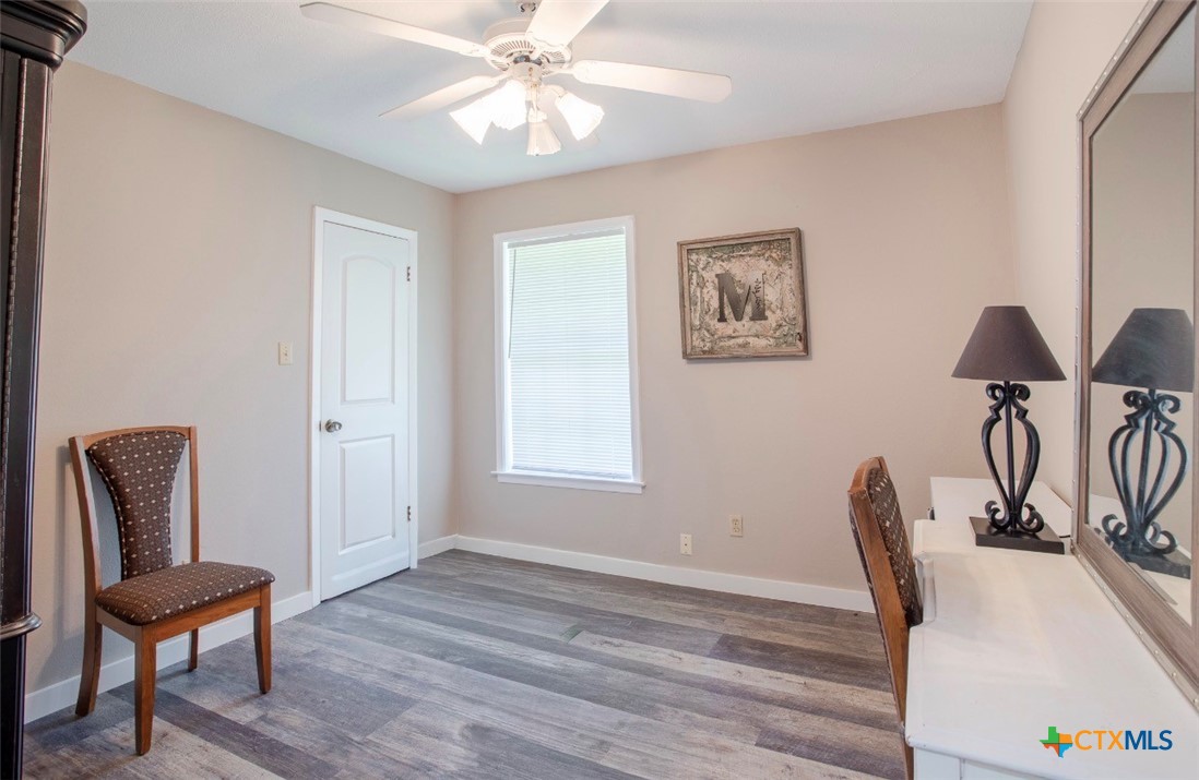 188 Cavalry Road Victoria, TX 77905 - Photo 6 of 30 a view of a workspace with furniture and a window