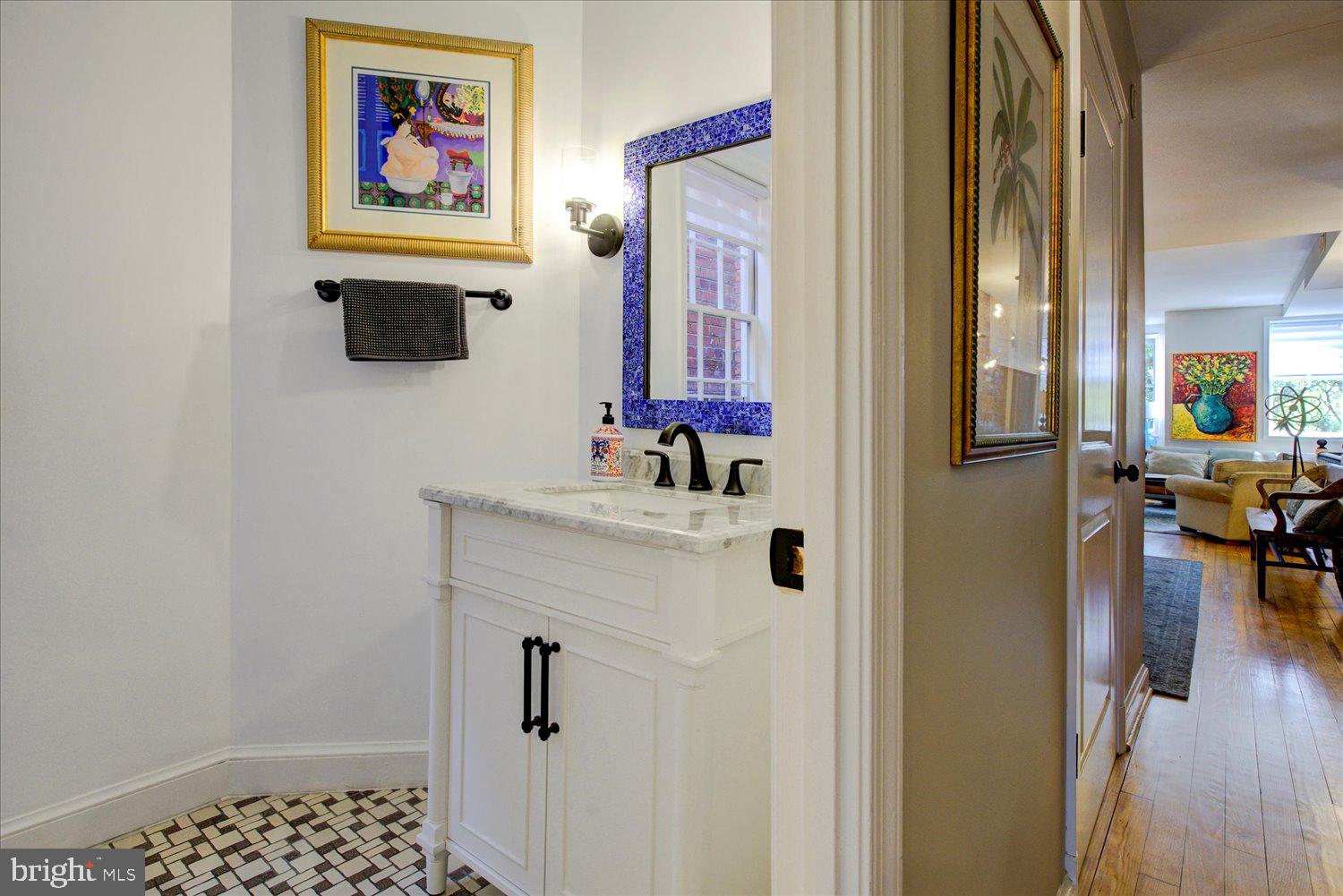 1118 F Street Northeast Washington, DC 20002 - Photo 16 of 62 a bathroom with a sink and a mirror