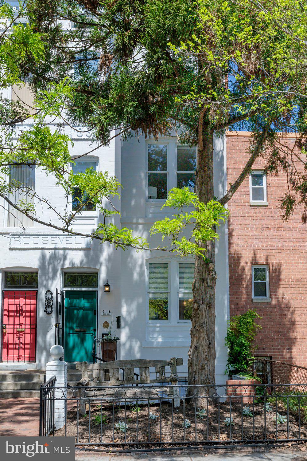 1118 F Street Northeast Washington, DC 20002 - Photo 2 of 62 a front view of a house with plants