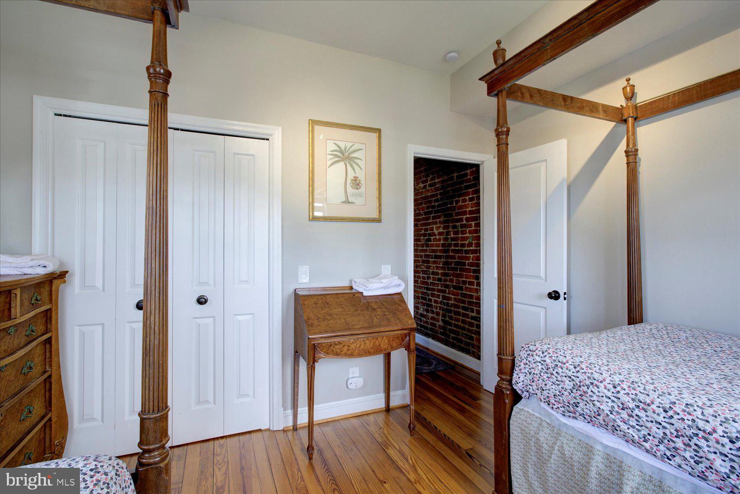 1118 F Street Northeast Washington, DC 20002 - Photo 28 of 62 a bedroom with a bed and a dresser