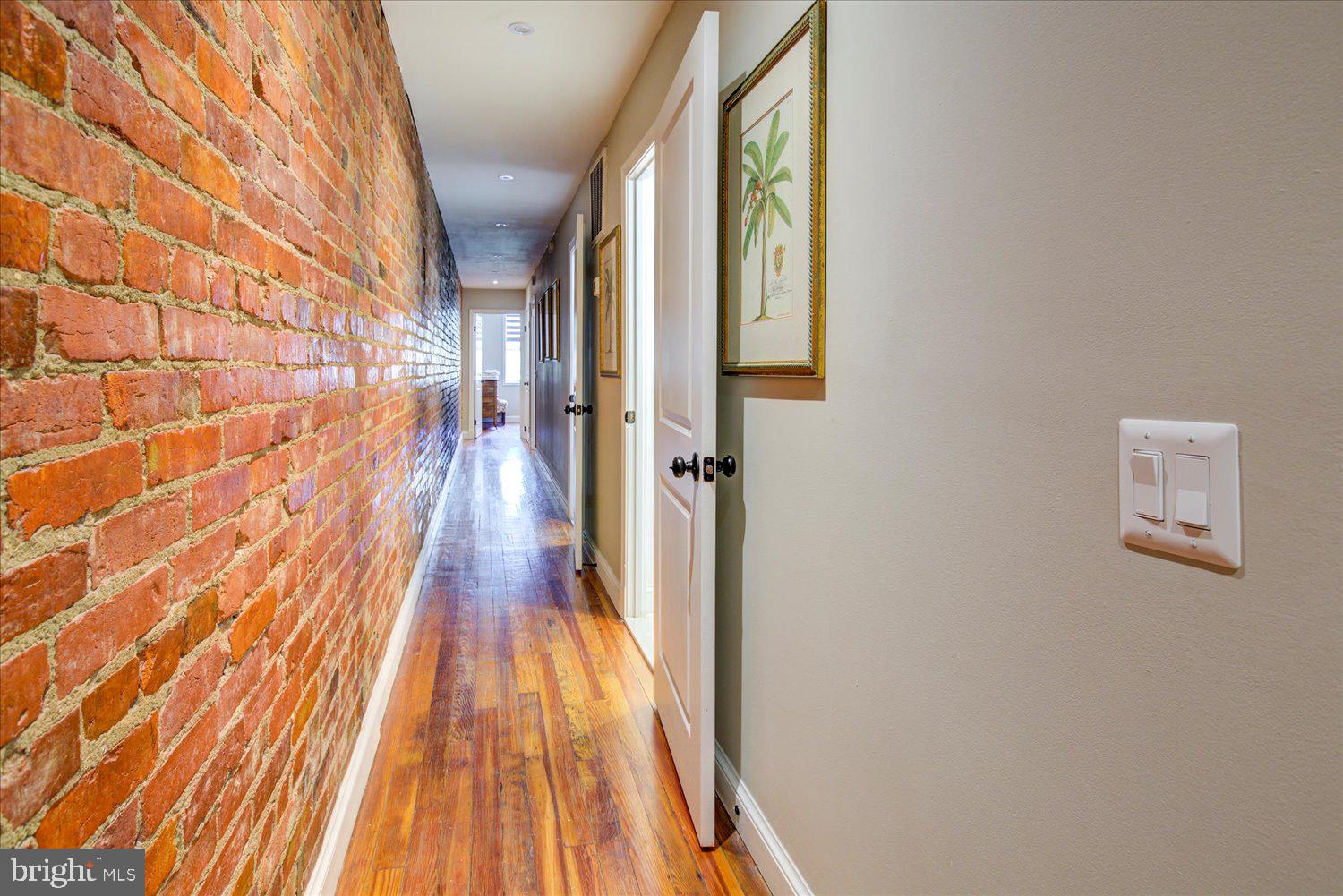 1118 F Street Northeast Washington, DC 20002 - Photo 38 of 62 a view of a hallway with wooden floor