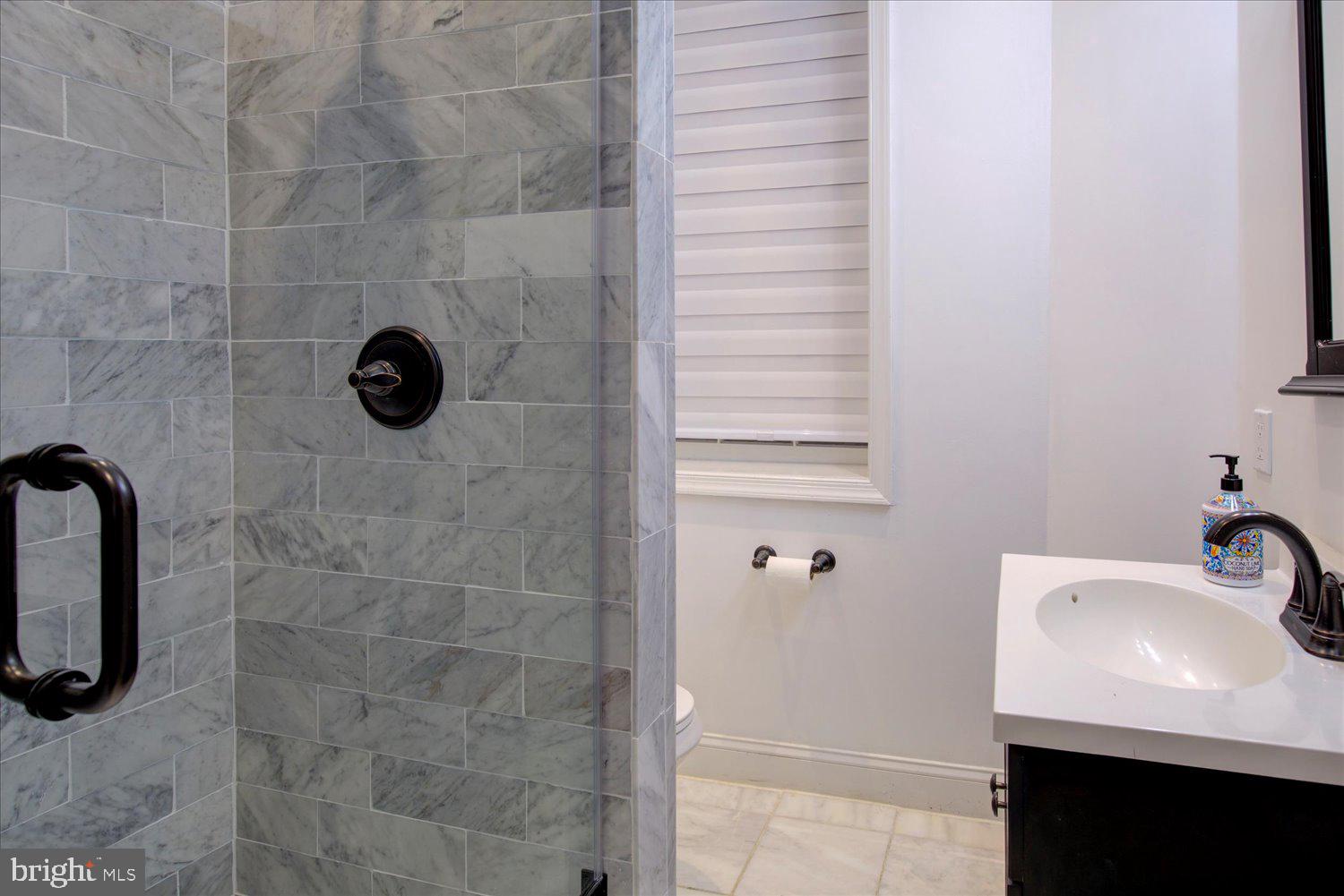 1118 F Street Northeast Washington, DC 20002 - Photo 43 of 62 a bathroom with a sink