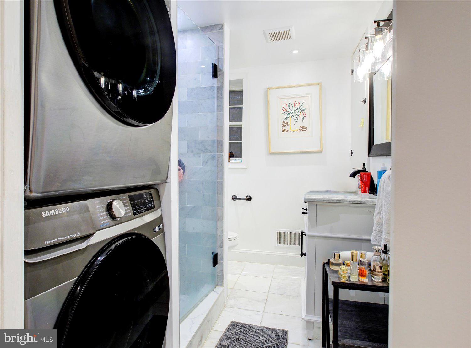 1118 F Street Northeast Washington, DC 20002 - Photo 57 of 62 a utility room with dryer and washer