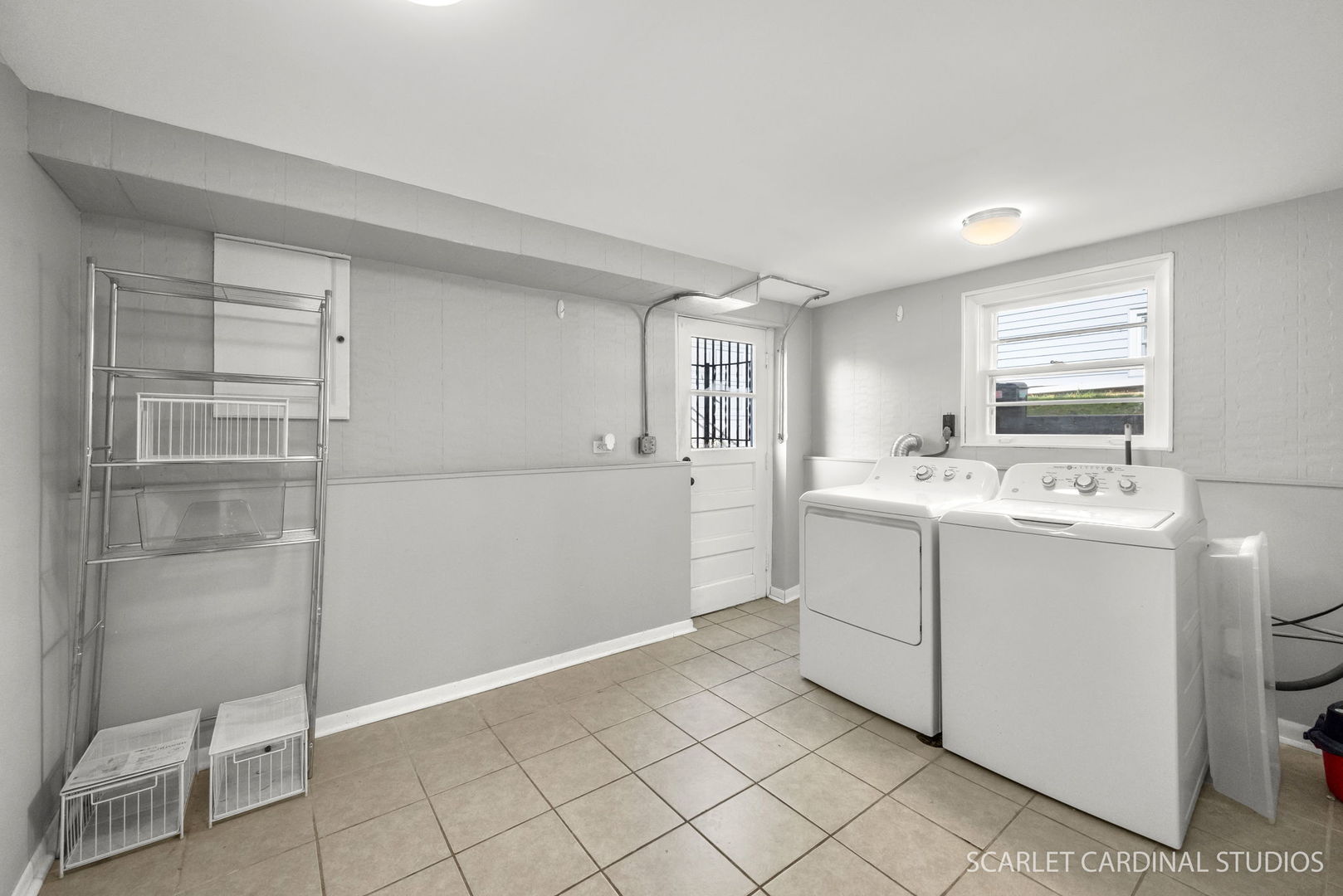 1445 North Webster Street Naperville, IL 60563 - Photo 11 of 16 a utility room with cabinets washer and dryer