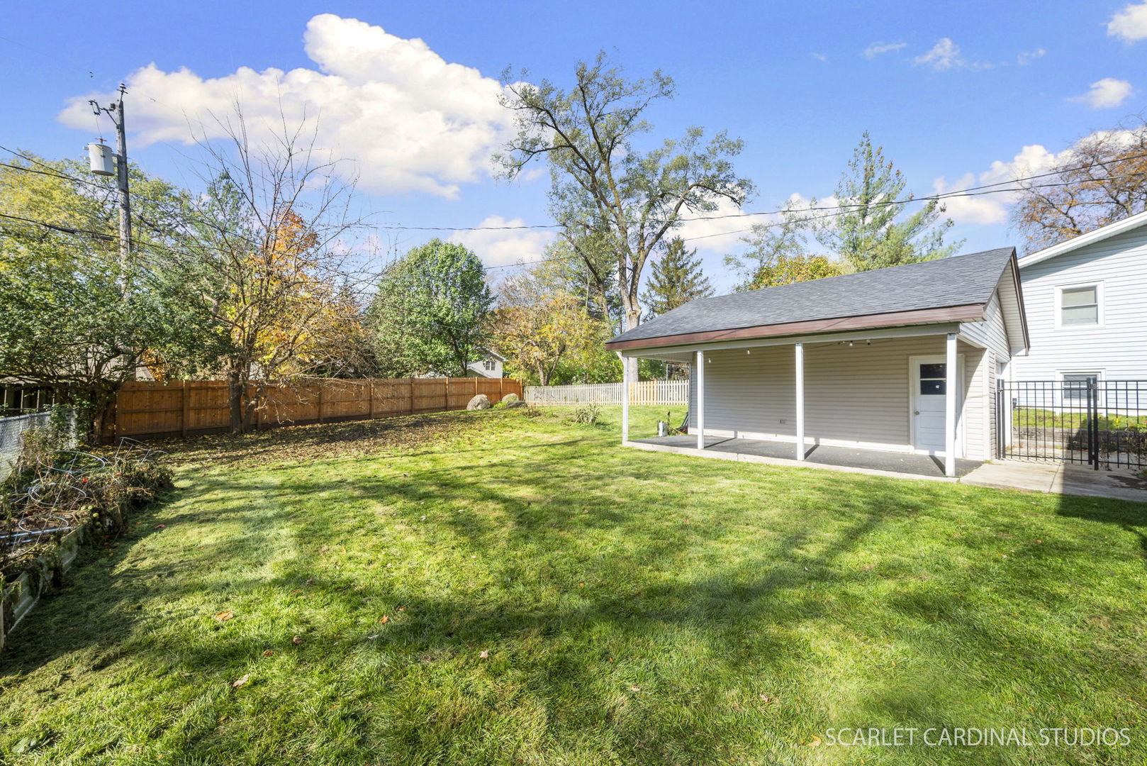 1445 North Webster Street Naperville, IL 60563 - Photo 15 of 16 a front view of a house with garden