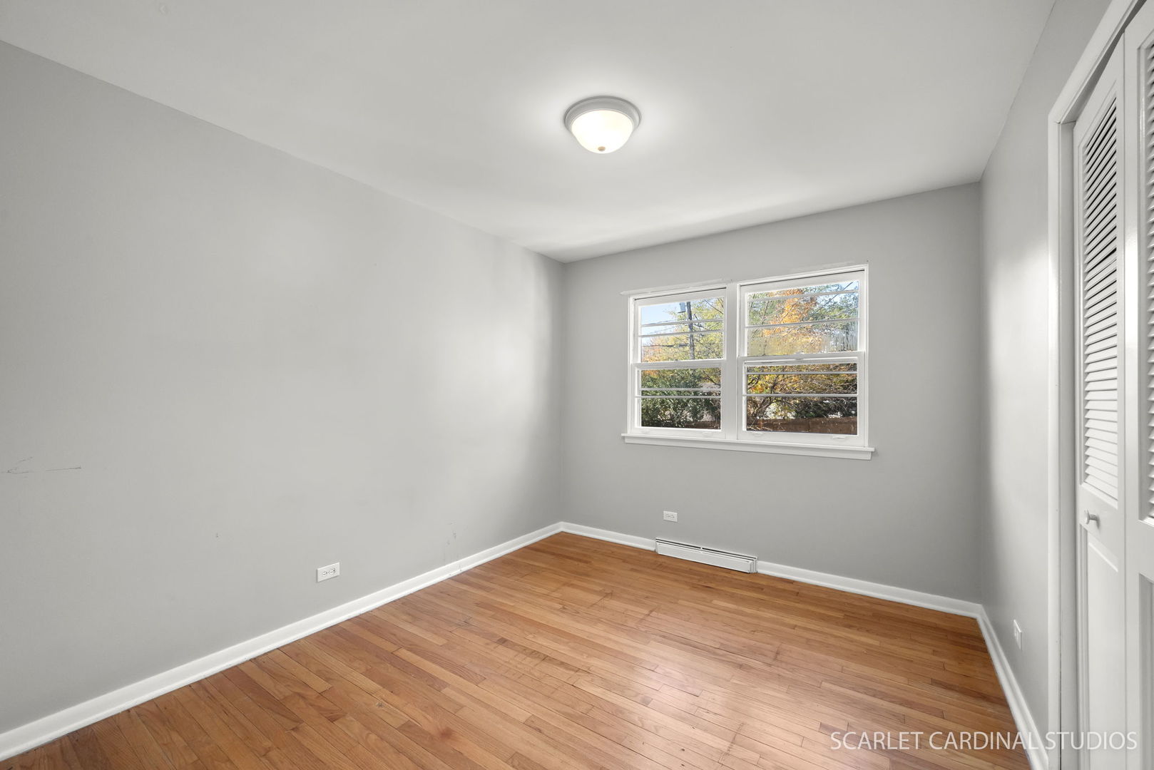 1445 North Webster Street Naperville, IL 60563 - Photo 8 of 16 an empty room with a window