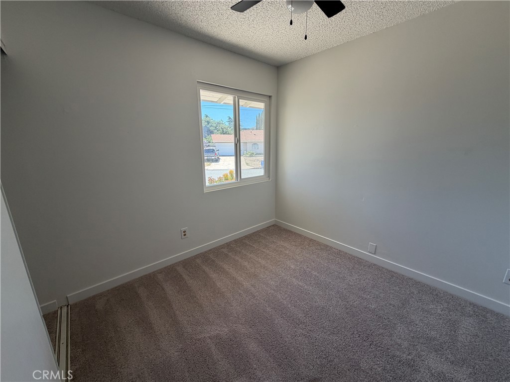 14538 Springvale Street Poway, CA 92064 - Photo 23 of 47 an empty room with a window