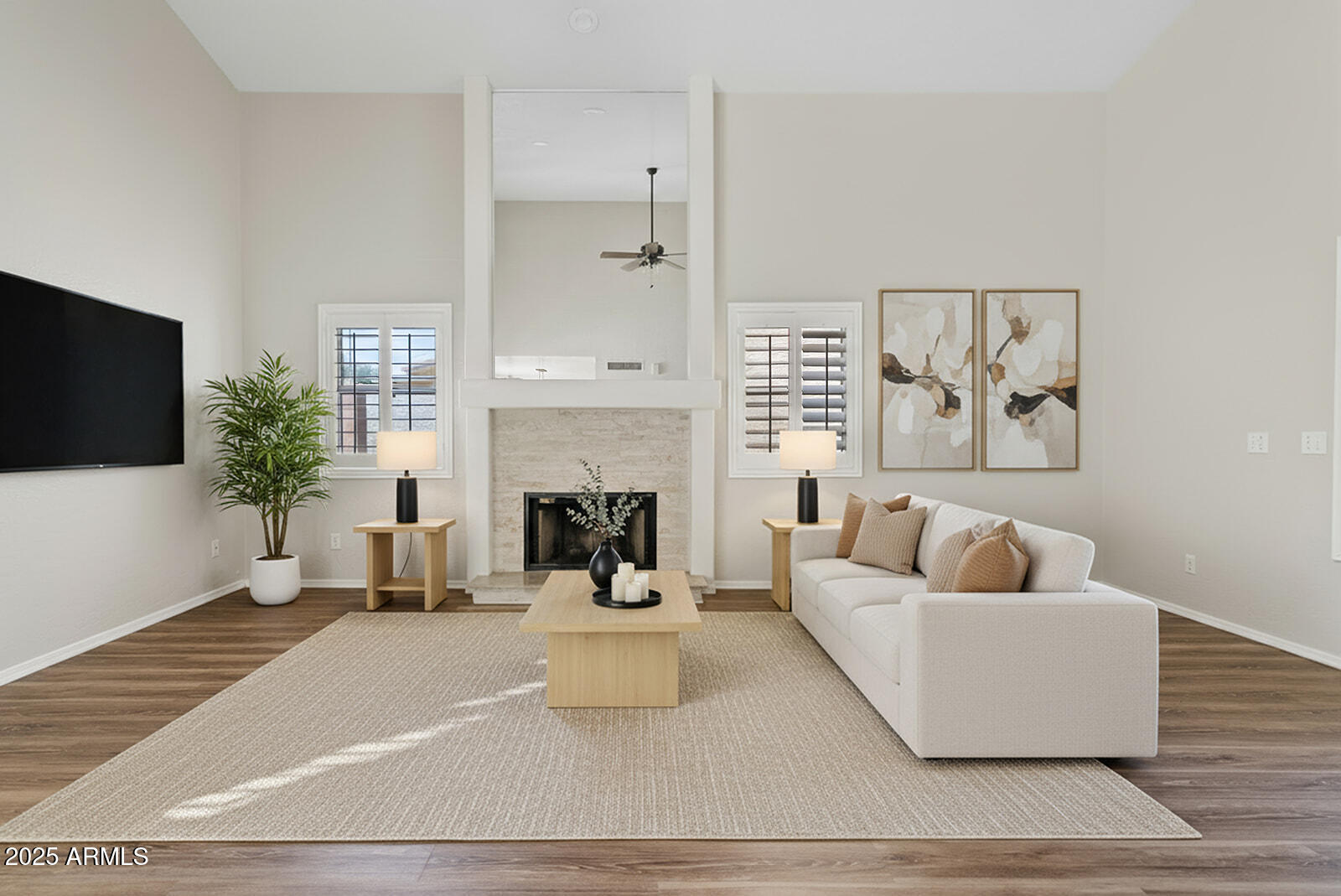 861 West Shellfish Drive Gilbert, AZ 85233 - Photo 2 of 32 a living room with furniture and a fireplace