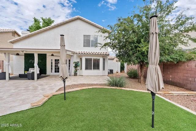 a view of a house with a patio