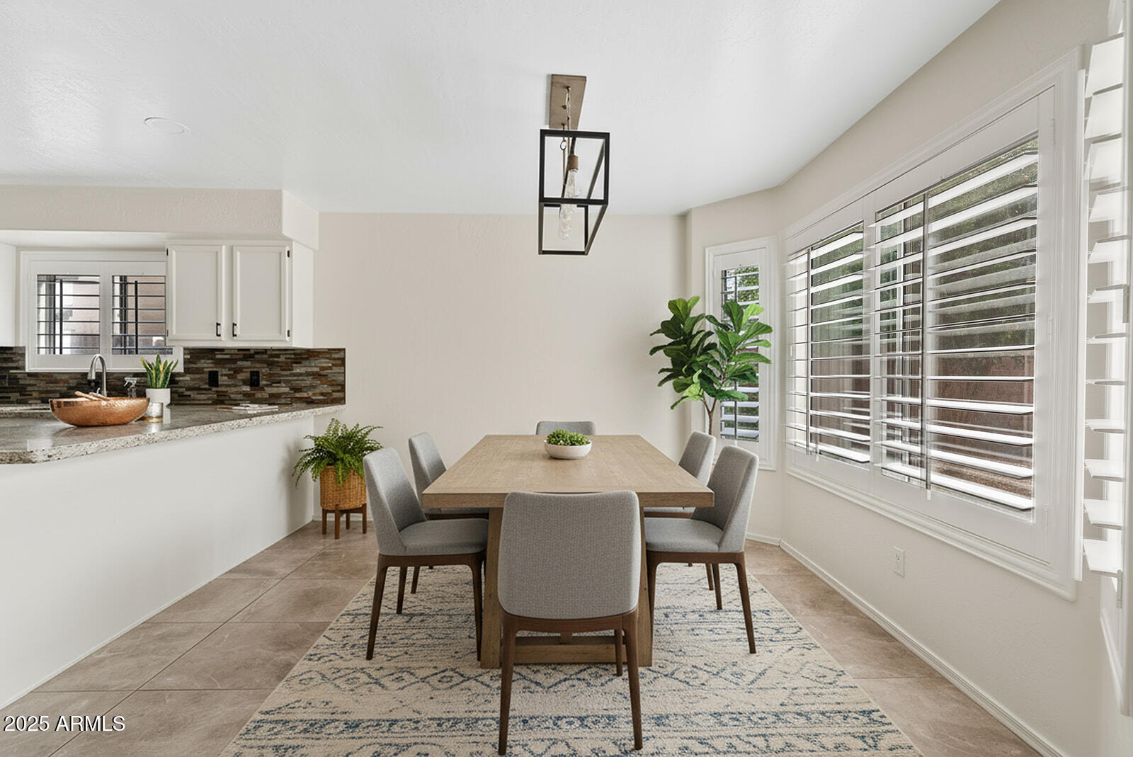 861 West Shellfish Drive Gilbert, AZ 85233 - Photo 4 of 32 a view of a dining room with furniture window and outside view