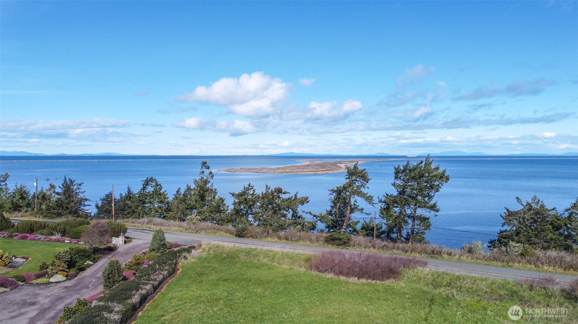 9999 Marine Drive Sequim, WA 98382 - Photo 11 of 20 a view of a yard with ocean view