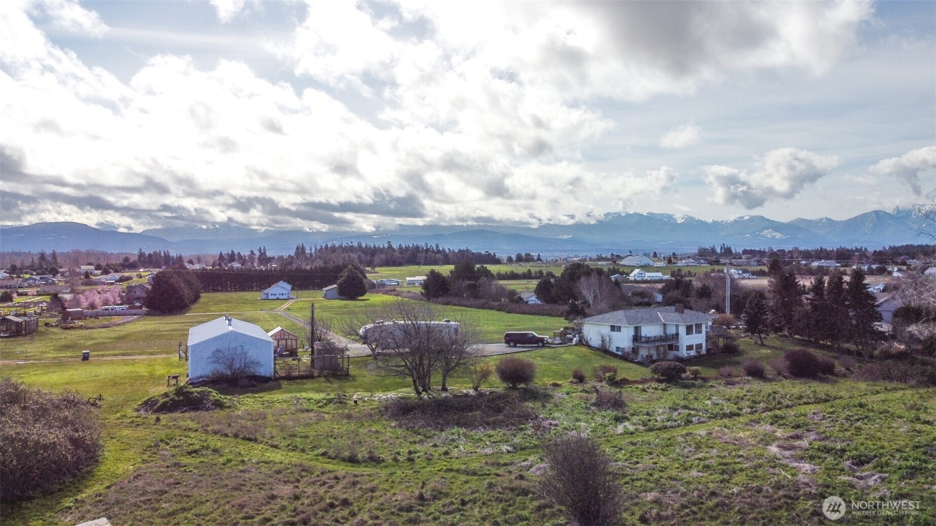 9999 Marine Drive Sequim, WA 98382 - Photo 13 of 20 an aerial view of residential houses with outdoor space