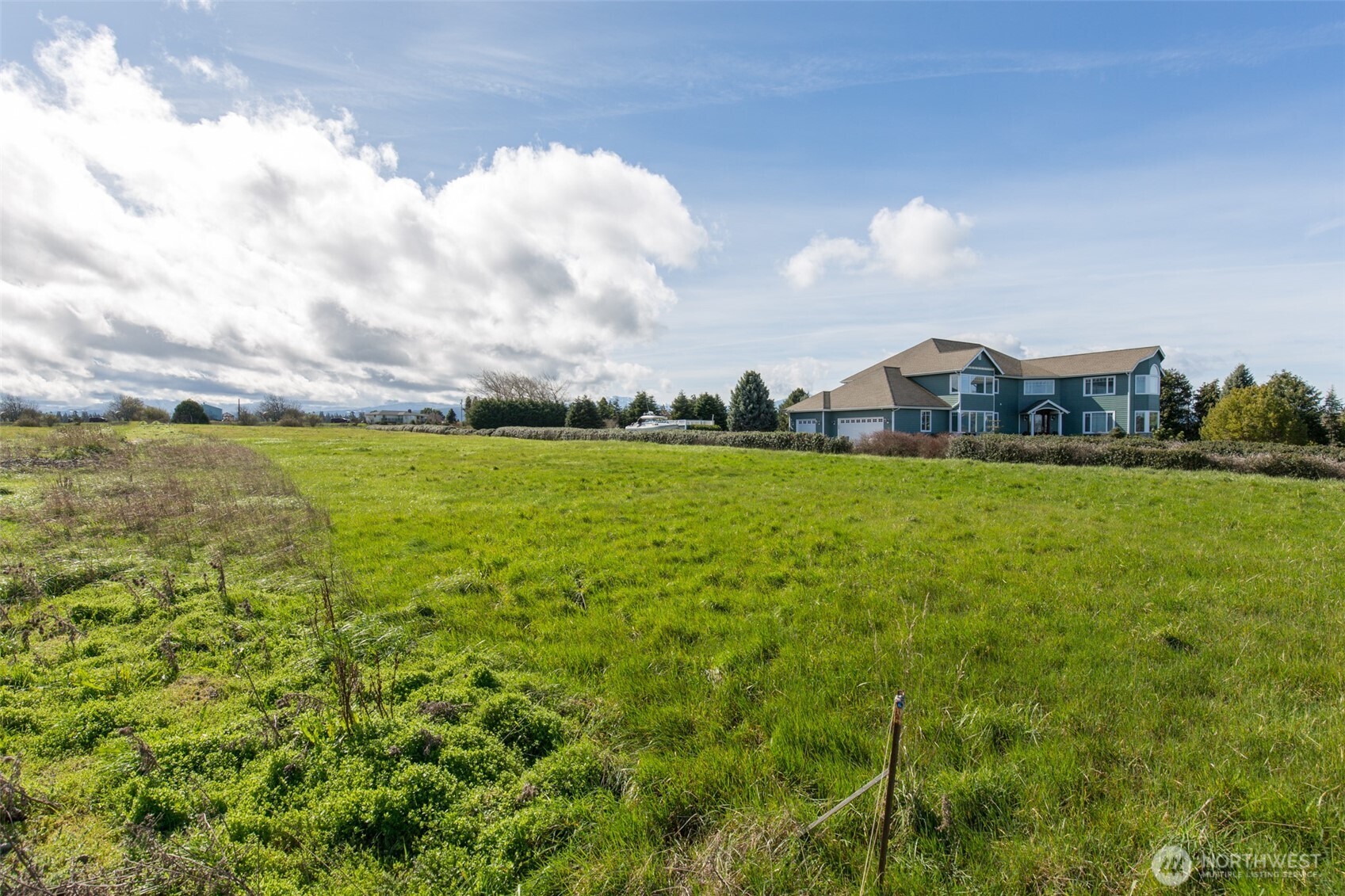 9999 Marine Drive Sequim, WA 98382 - Photo 19 of 20 a view of a big yard with a house