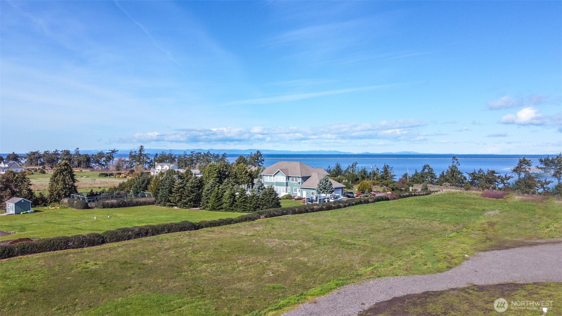 9999 Marine Drive Sequim, WA 98382 - Photo 7 of 20 a view of a field with an ocean