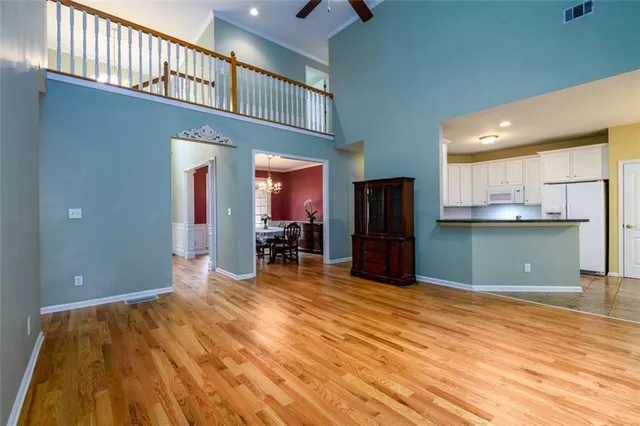 a view of a kitchen with a sink and cabinets