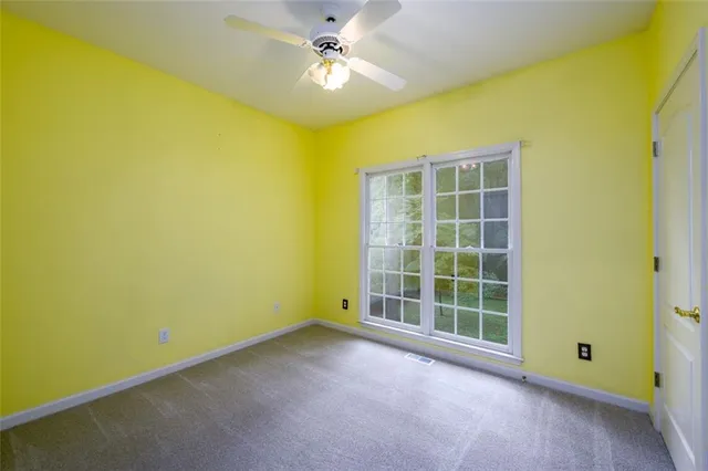 an empty room with windows