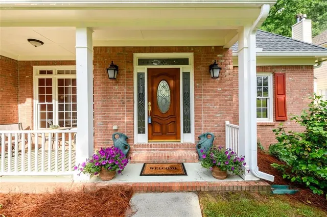 a front view of a house with a porch