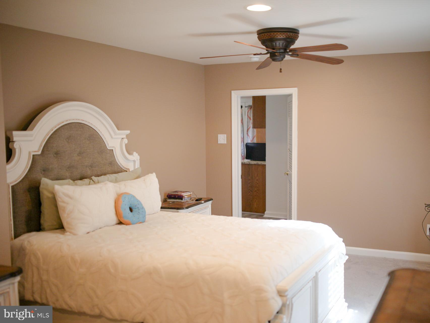 7308 Federalsburg Road Bridgeville, DE 19933 - Photo 16 of 24 a bedroom with a bed and a window
