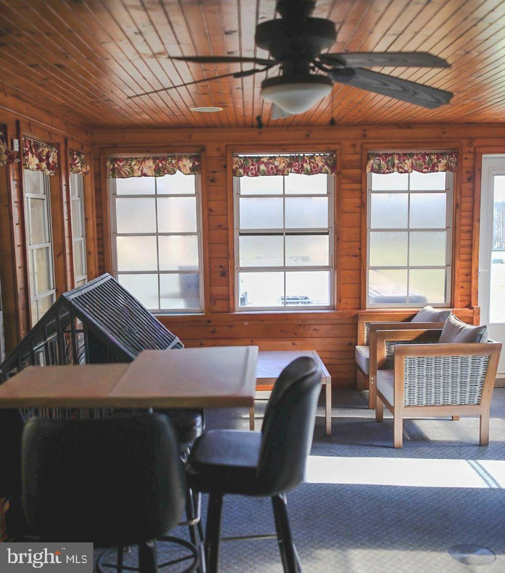 7308 Federalsburg Road Bridgeville, DE 19933 - Photo 18 of 24 a view of a dining room with furniture window and outside view