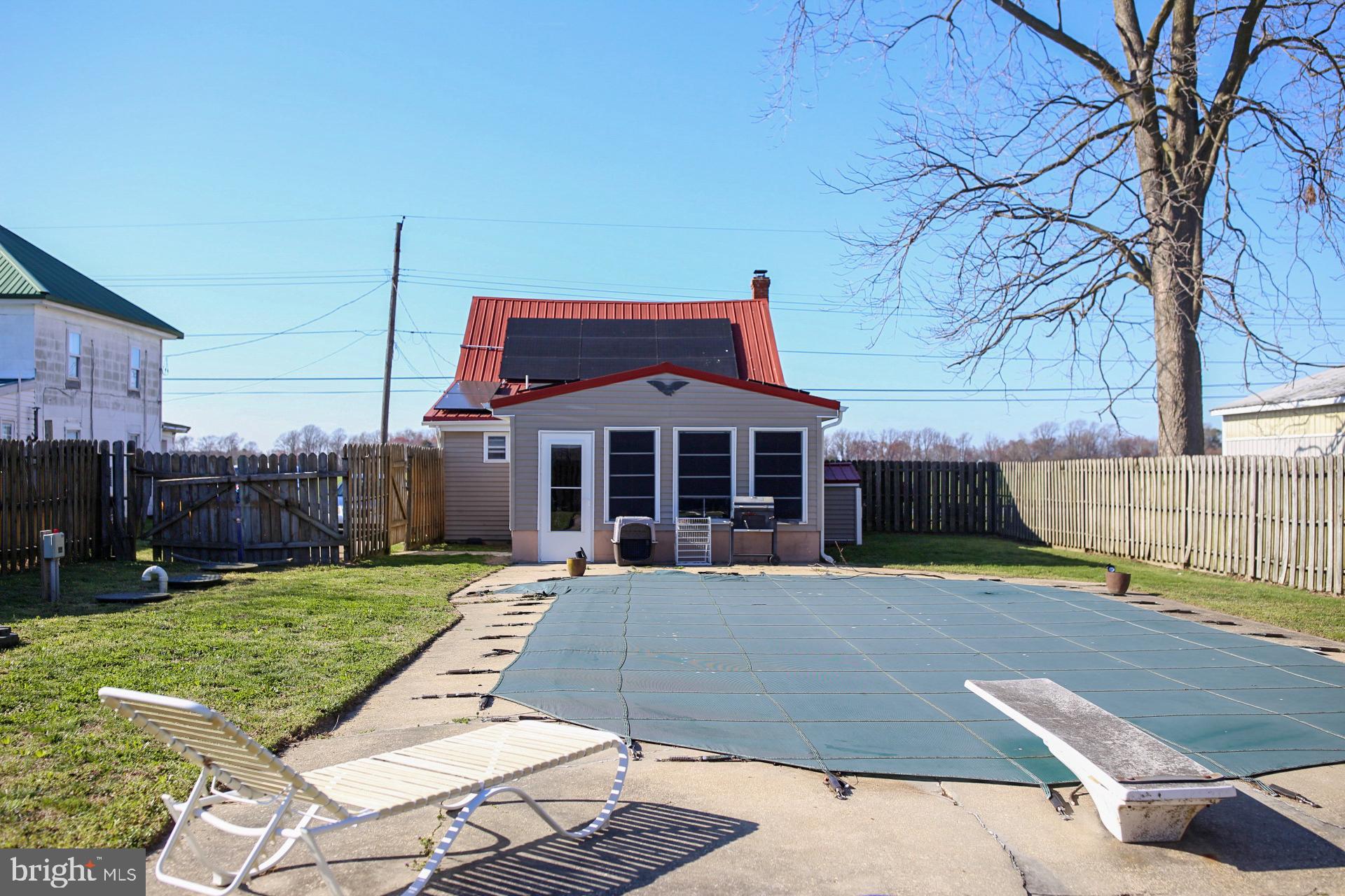 7308 Federalsburg Road Bridgeville, DE 19933 - Photo 24 of 24 a view of a house with backyard and sitting area