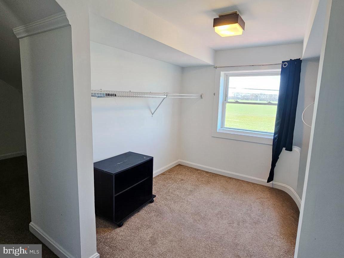 7308 Federalsburg Road Bridgeville, DE 19933 - Photo 6 of 24 a view of an empty room with a window