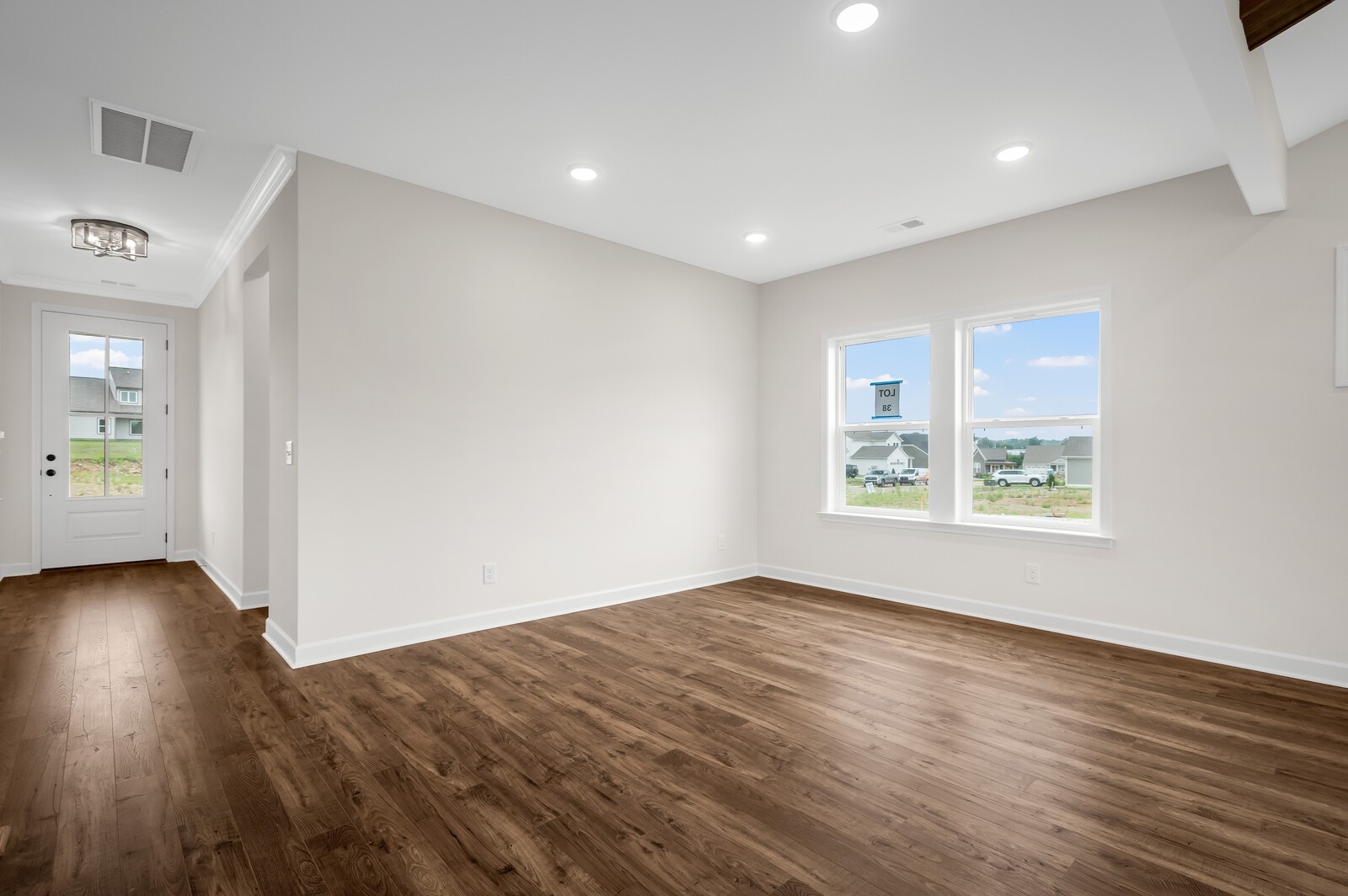 1733 Merkel Road Columbia, TN 38401 - Photo 15 of 53 a view of an empty room with wooden floor and a window