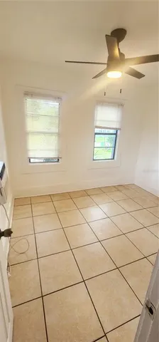 a bathroom with a sink a mirror and shower