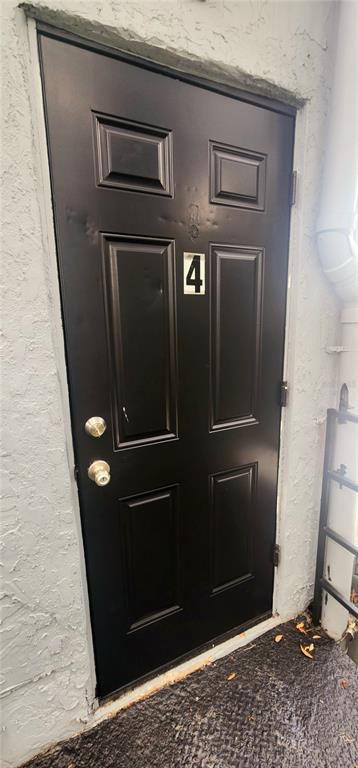 301 Ave B Southeast, Unit 4 Winter Haven, FL 33880 - Photo 3 of 16 a view of a door