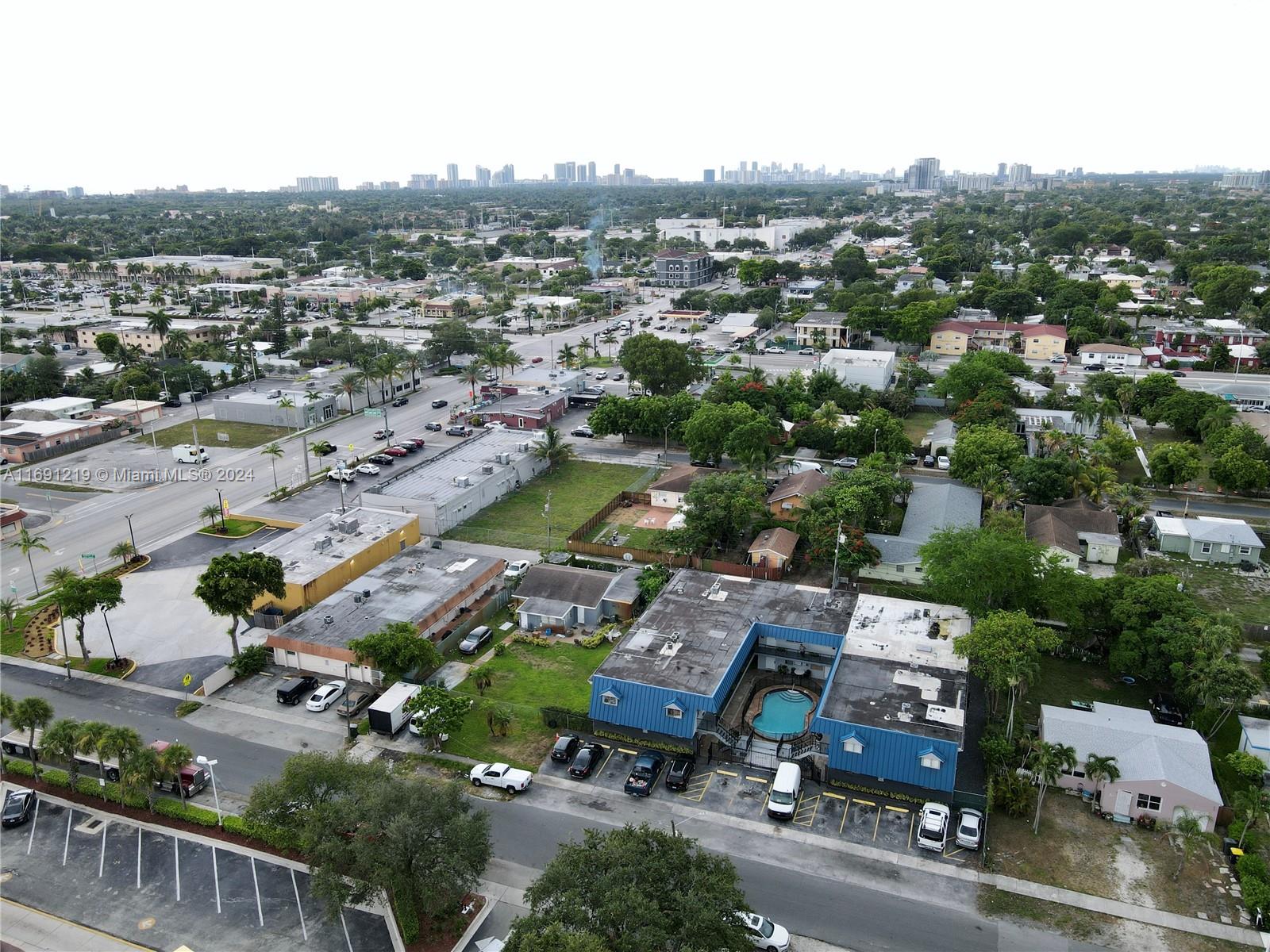 37 Southwest 14th Street, Unit 16 Dania Beach, FL 33004 - Photo 3 of 11 an aerial view of a city with lots of residential buildings