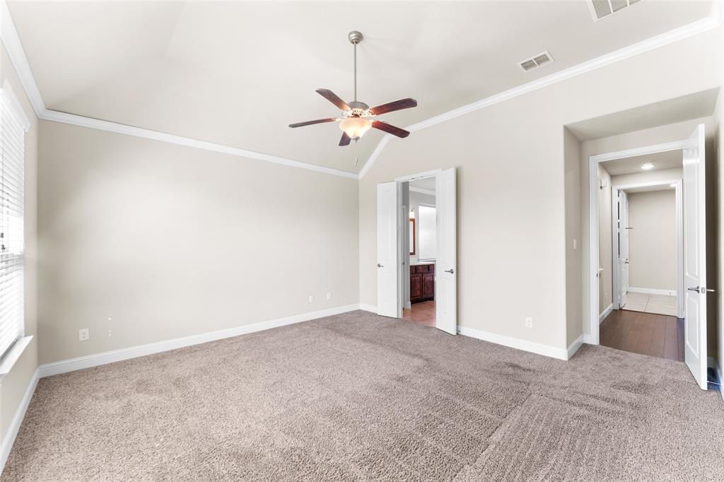 1425 Barrolo Drive McLendon-Chisholm, TX 75032 - Photo 19 of 38 a view of a big room with closet and a ceiling fan