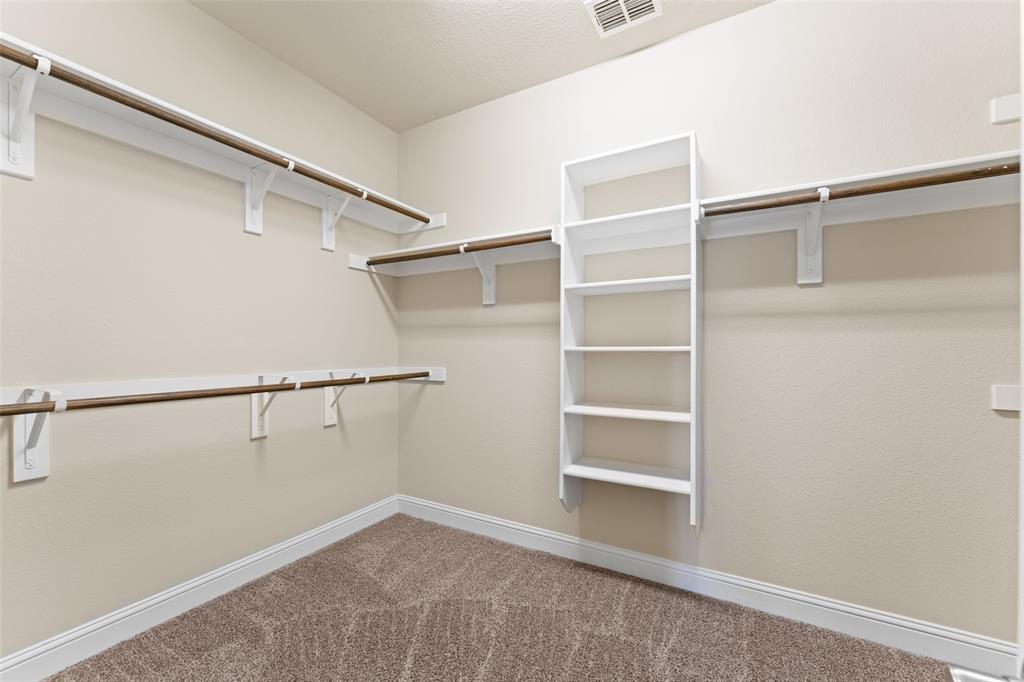 1425 Barrolo Drive McLendon-Chisholm, TX 75032 - Photo 24 of 38 a view of an empty walk in closet