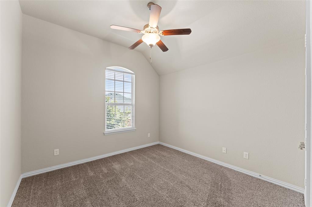 1425 Barrolo Drive McLendon-Chisholm, TX 75032 - Photo 27 of 38 an empty room with a window and a fan