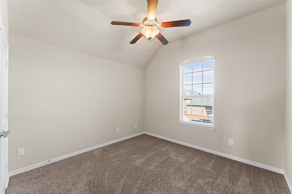 1425 Barrolo Drive McLendon-Chisholm, TX 75032 - Photo 28 of 38 an empty room with windows and fan