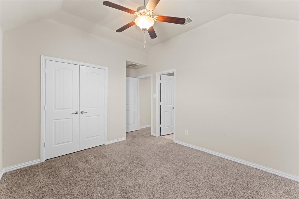 1425 Barrolo Drive McLendon-Chisholm, TX 75032 - Photo 32 of 38 a view of an empty room and chandelier fan