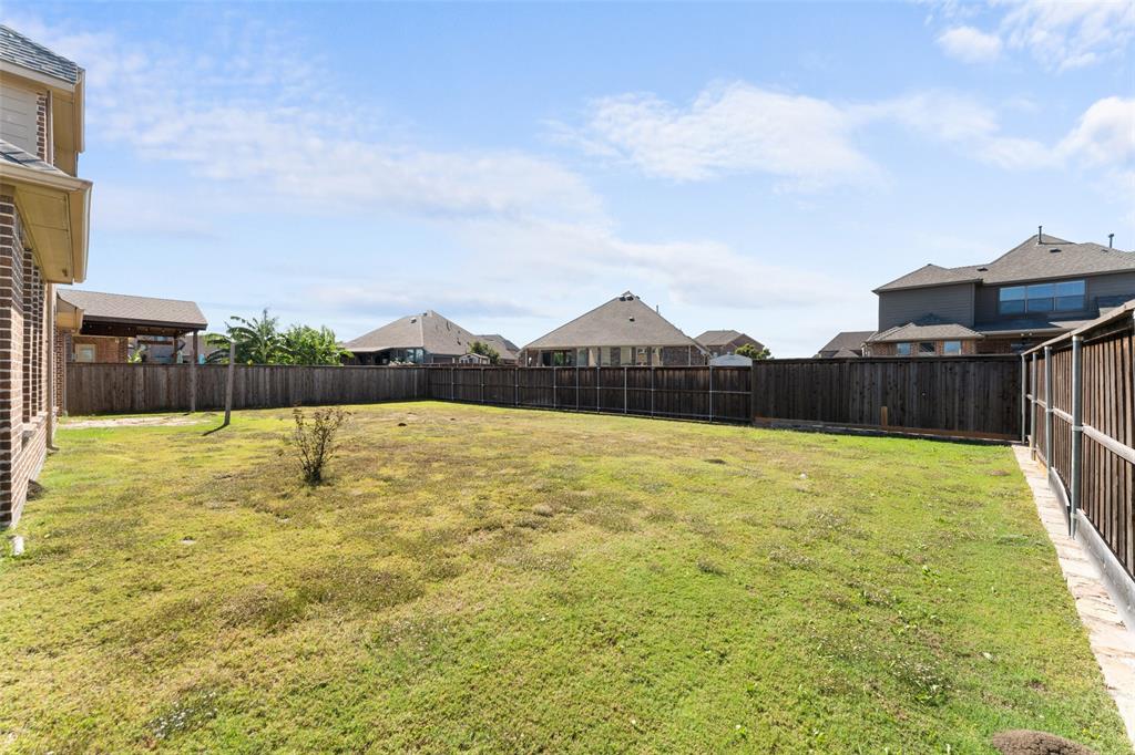 1425 Barrolo Drive McLendon-Chisholm, TX 75032 - Photo 36 of 38 a view of a swimming pool with a yard