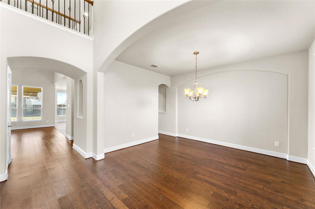 1425 Barrolo Drive McLendon-Chisholm, TX 75032 - Photo 10 of 38 a view of a room with wooden floor and window